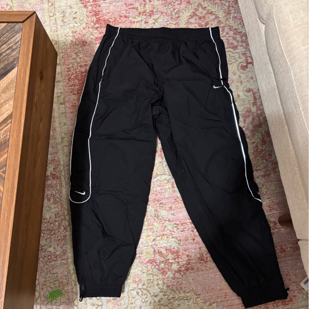 Nike solo swoosh pants